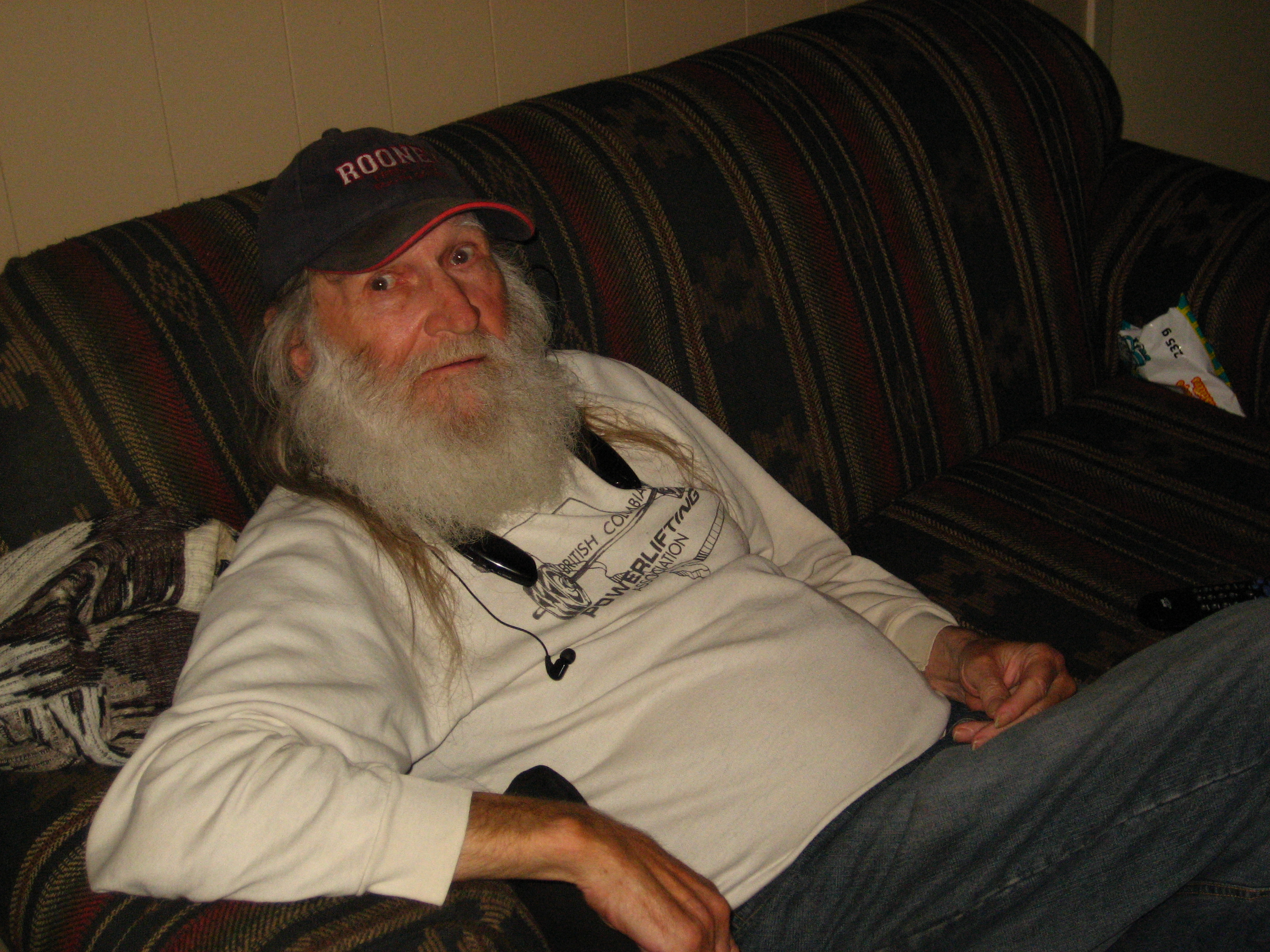 Glen Kealey relaxing on a couch